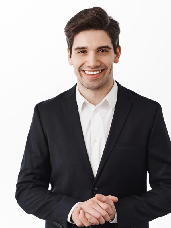 Handsome corporate man, real estate agent assistant smiling, hold hands together, how may I help you, smiling friendly and polite, assist customer, white background.